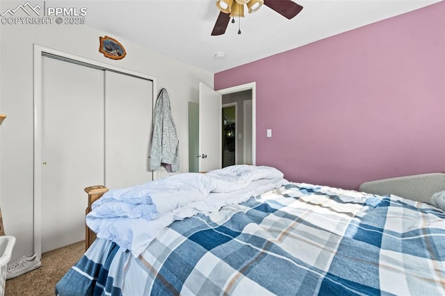 bedroom with carpet flooring, ceiling fan, and a closet