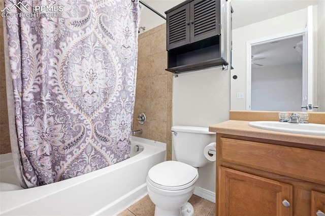 full bathroom featuring vanity, toilet, tile patterned flooring, and shower / bath combo with shower curtain