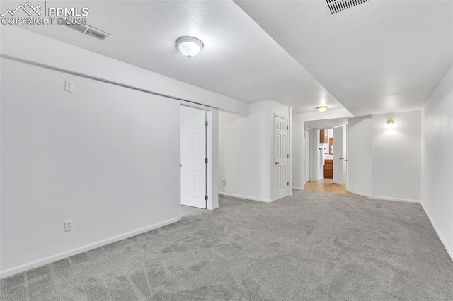 interior space with light colored carpet