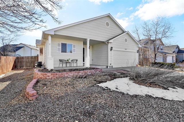 view of front of home featuring a garage and covered porch