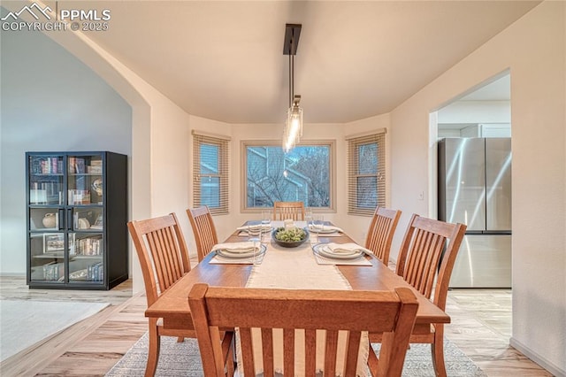 dining space featuring light hardwood / wood-style floors