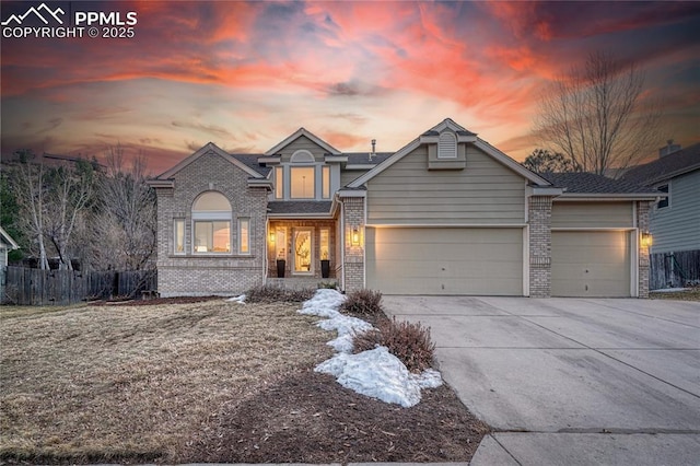 view of front of property with a garage