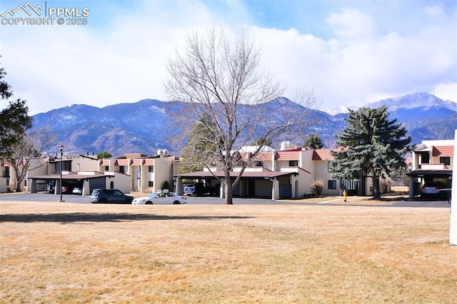 property view of mountains featuring a residential view