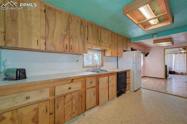 kitchen with sink, dishwasher, and white fridge