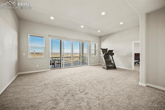 interior space featuring baseboards, visible vents, and recessed lighting