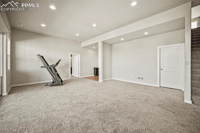 exercise area with baseboards, carpet, visible vents, and recessed lighting