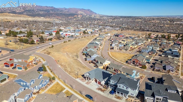 aerial view with a mountain view and a residential view