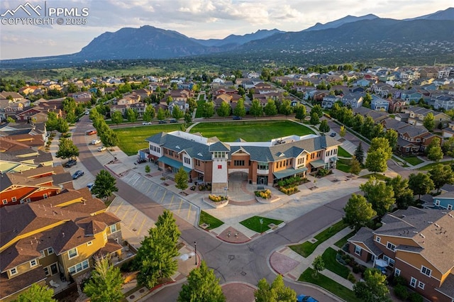 bird's eye view featuring a residential view and a mountain view