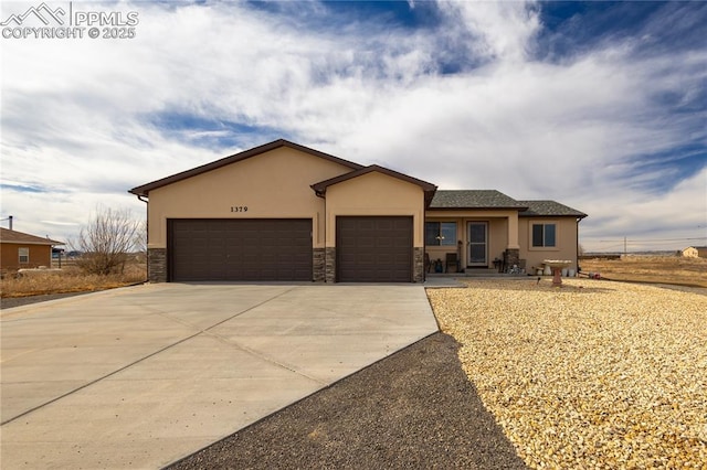 view of front of home with a garage