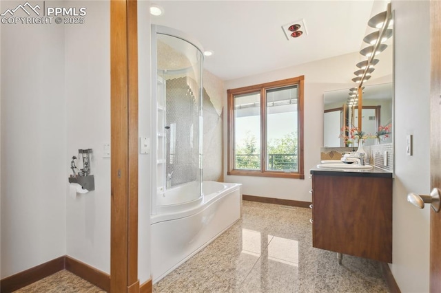 bathroom featuring shower with separate bathtub and vanity