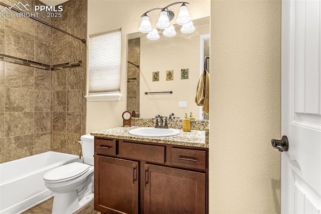 bathroom featuring shower / bathing tub combination, vanity, and toilet