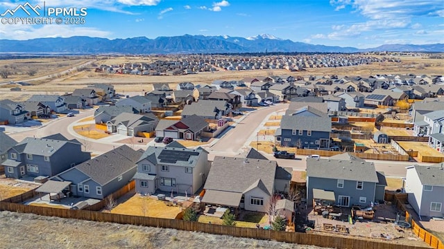 bird's eye view featuring a mountain view and a residential view