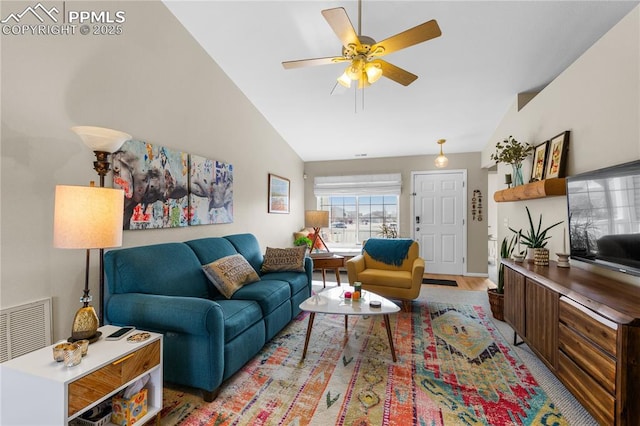 living room with vaulted ceiling and ceiling fan