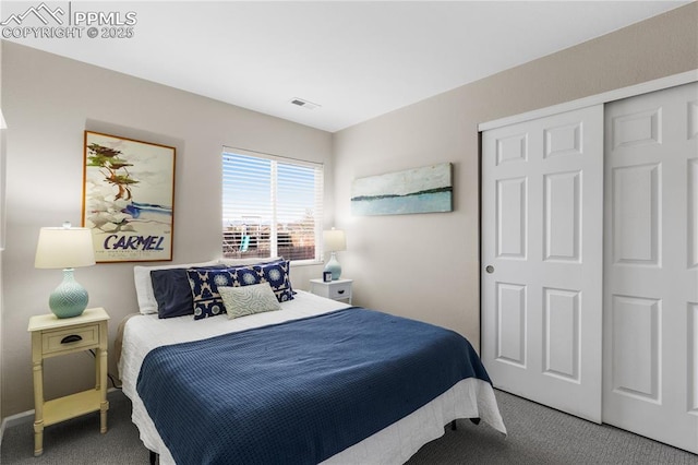 bedroom featuring a closet and carpet flooring