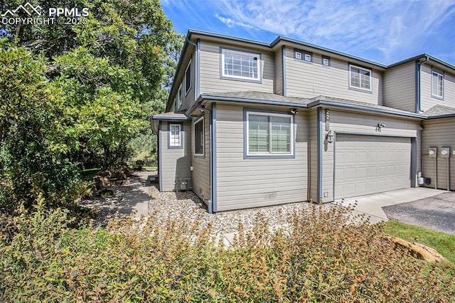 view of front of house with a garage