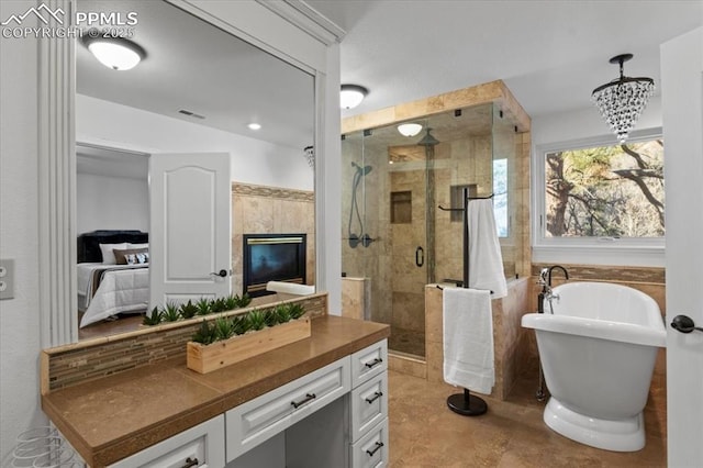 bathroom with vanity and plus walk in shower