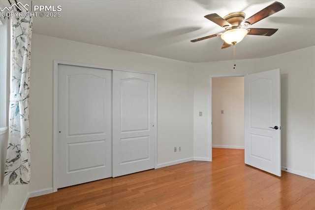 unfurnished bedroom with a closet, ceiling fan, and light hardwood / wood-style flooring