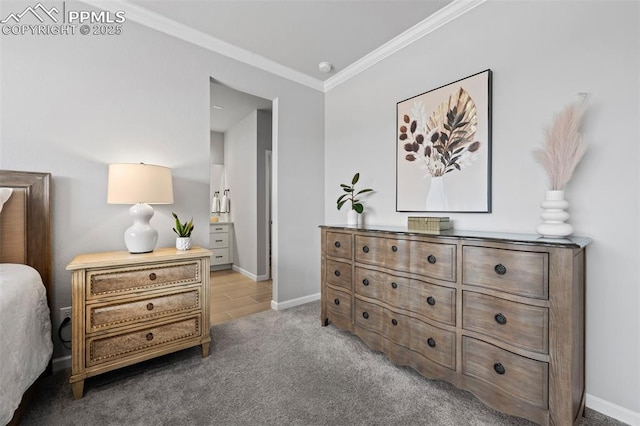 carpeted bedroom with ornamental molding