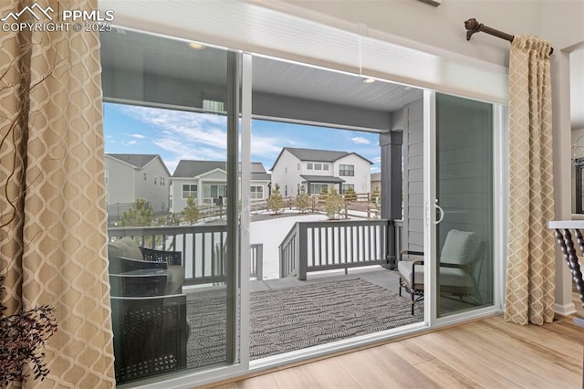 doorway featuring hardwood / wood-style floors