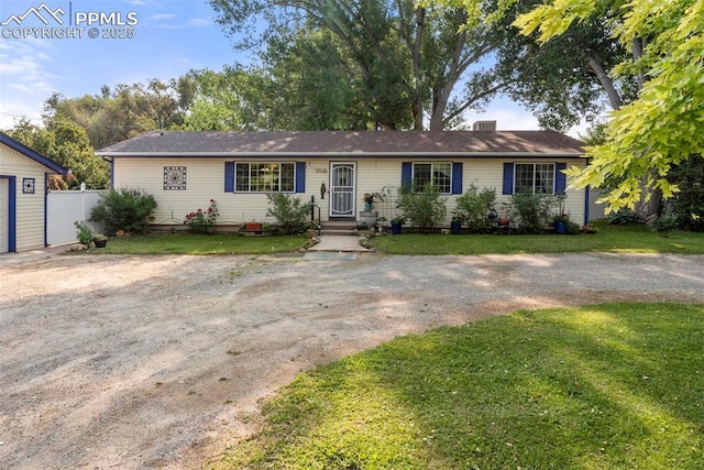 single story home featuring a front yard