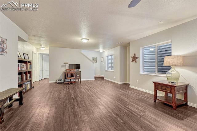 interior space featuring hardwood / wood-style floors and a textured ceiling