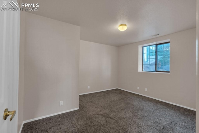 view of carpeted spare room