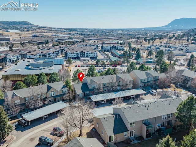 drone / aerial view featuring a mountain view