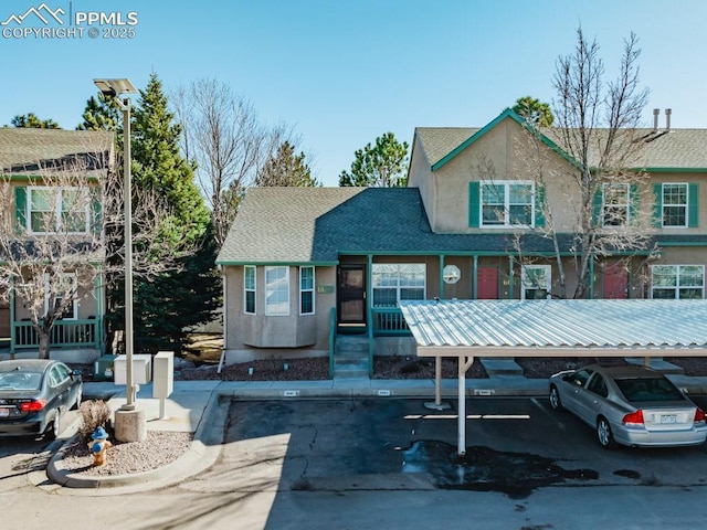 view of front of house featuring a carport