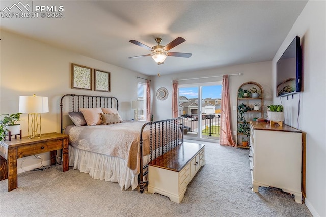 bedroom with ceiling fan, access to exterior, and light carpet