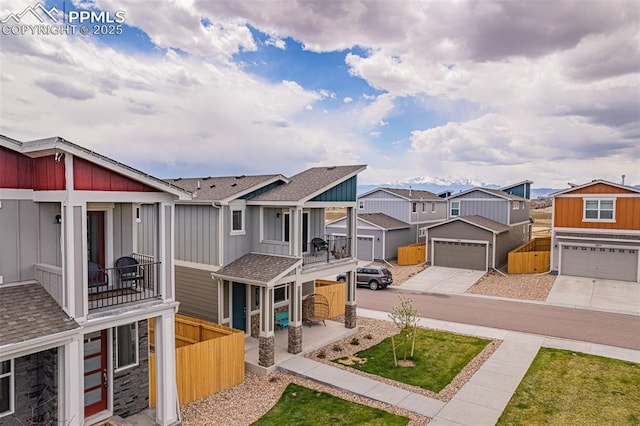 exterior space featuring a garage and a balcony