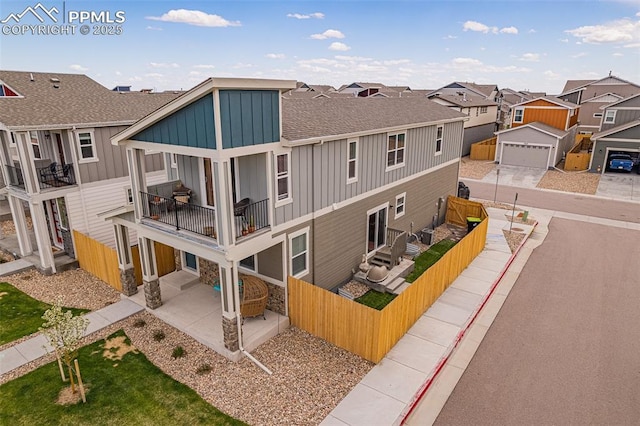 exterior space with a balcony and a patio area