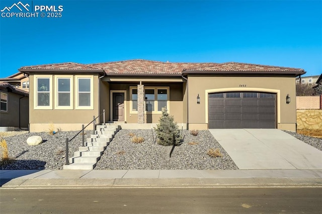 view of front of property with a garage