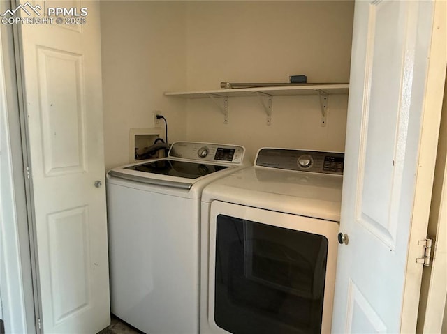 laundry area with washer and dryer