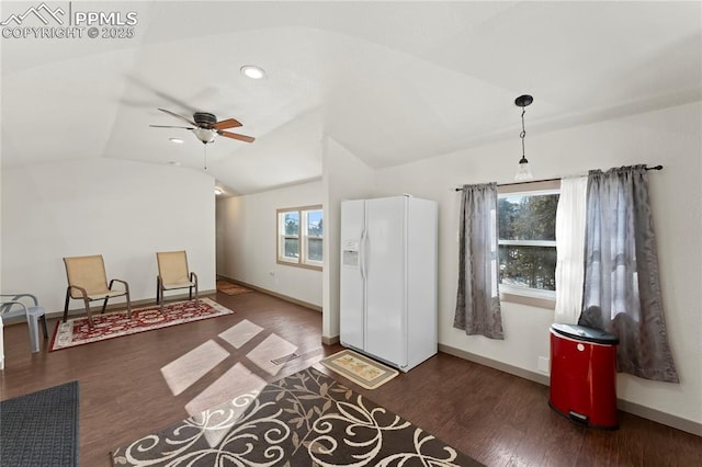 additional living space featuring vaulted ceiling, dark hardwood / wood-style floors, and ceiling fan