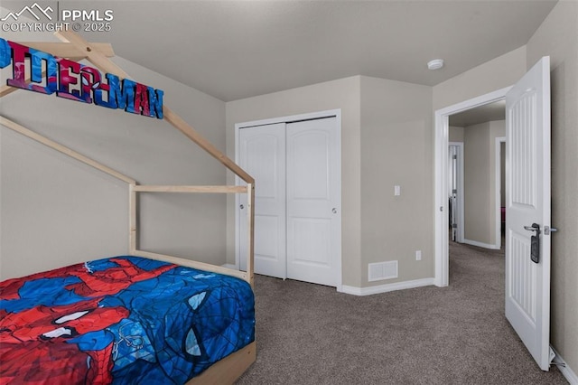 bedroom featuring a closet and carpet