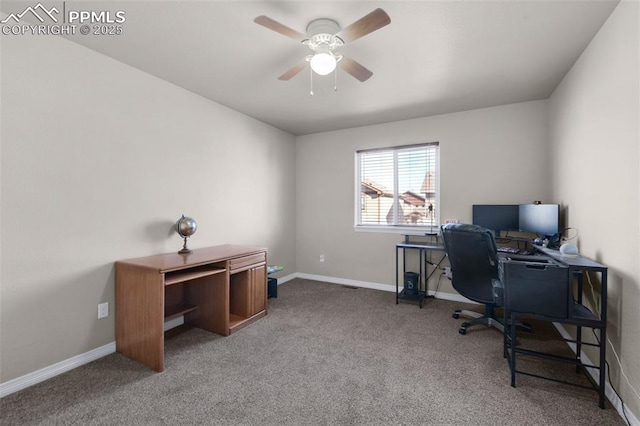 carpeted home office with ceiling fan