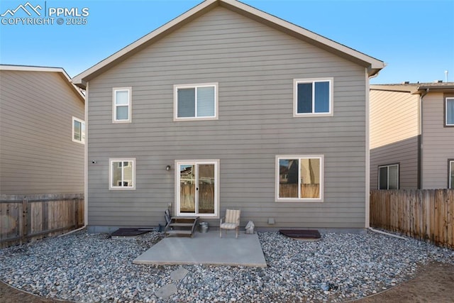 back of property featuring a patio area