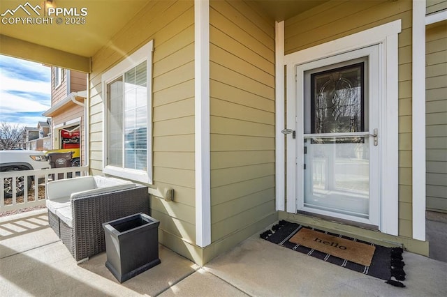 property entrance with a porch