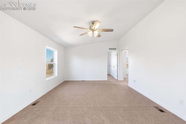 empty room with light carpet and ceiling fan