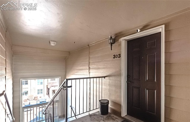 doorway to property with a balcony