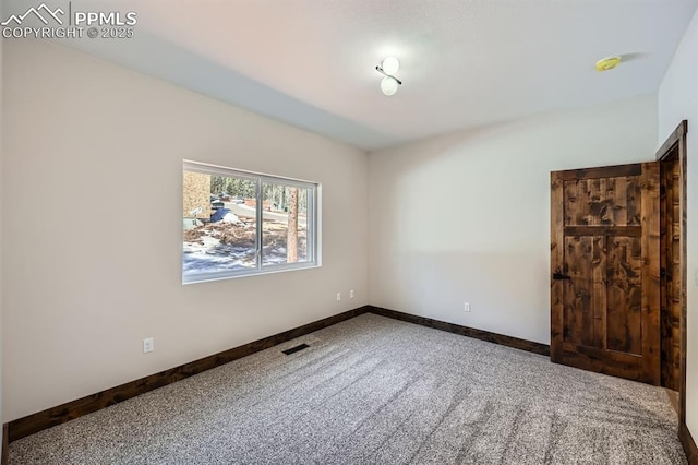 spare room with carpet flooring