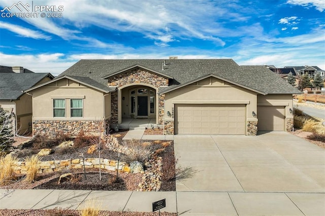 view of front of property featuring a garage