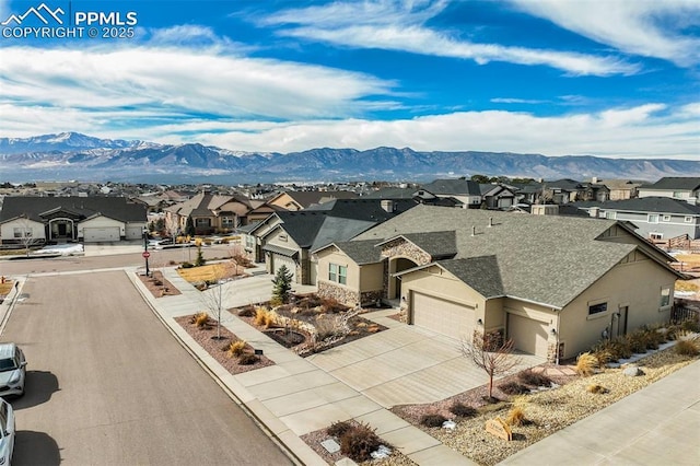 aerial view featuring a mountain view