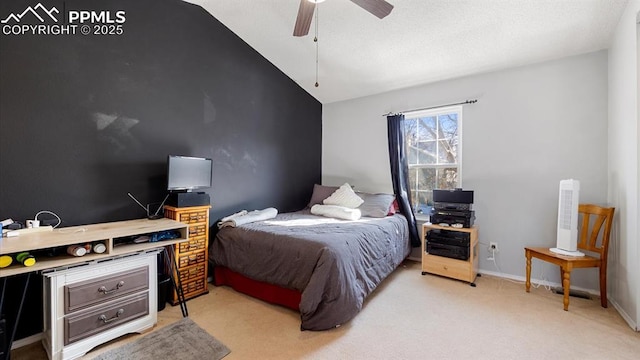 bedroom featuring lofted ceiling, light colored carpet, and ceiling fan