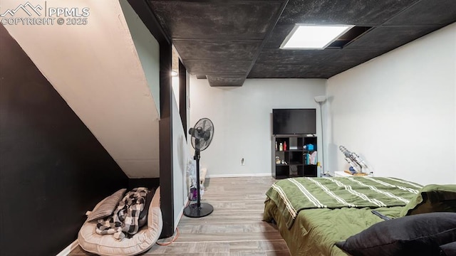 bedroom featuring hardwood / wood-style flooring