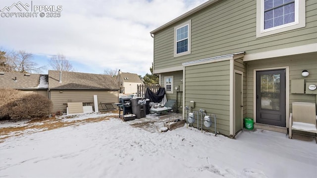 view of snow covered property