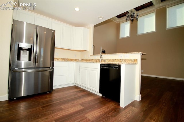 kitchen with light stone counters, stainless steel fridge with ice dispenser, white cabinets, and dishwasher