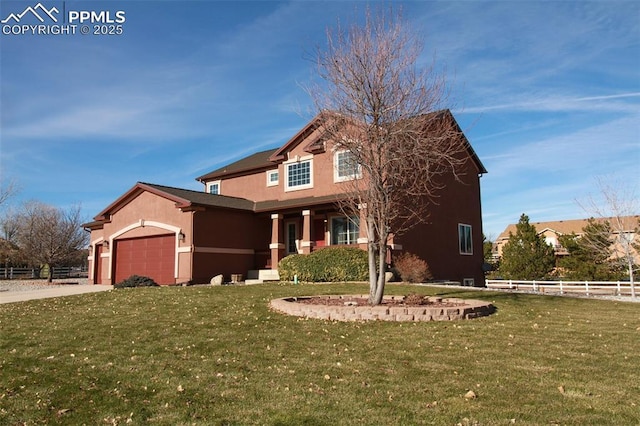 view of front facade featuring a garage and a front lawn