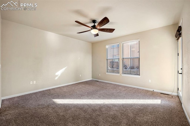 carpeted empty room with ceiling fan