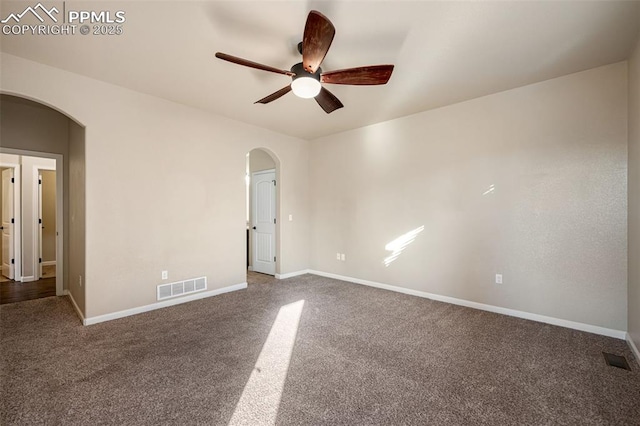 empty room with carpet and ceiling fan